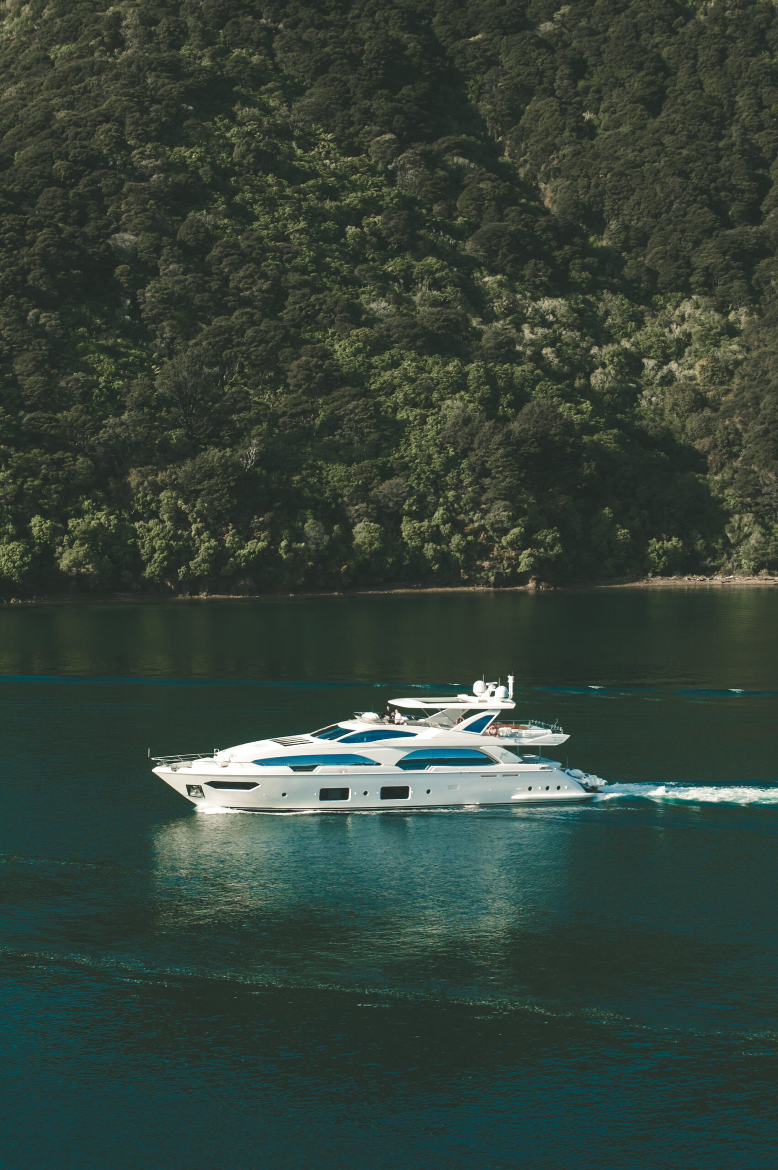 vertical-shot-yacht-body-water-new-zealand-scaled